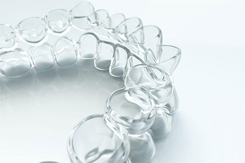 Clear bracelet with a smooth, polished finish, displayed against a white background.